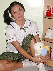 Petite dickgirl lifting her school skirt to flash her pecker
